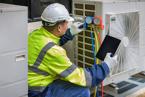 Professional Hvac technician working in Benld, IL